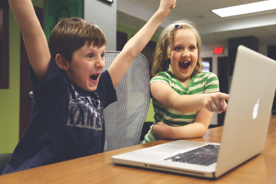 Excited Kids with Laptop